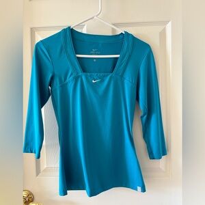 Nike Dri-Fit Tennis shirt, 3/4 sleeve, turquoise, size small.